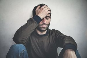 A man realizes he is exhibiting Vicodin addiction signs